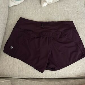 Lululemon size 6 women’s running shorts purple 4” inseam